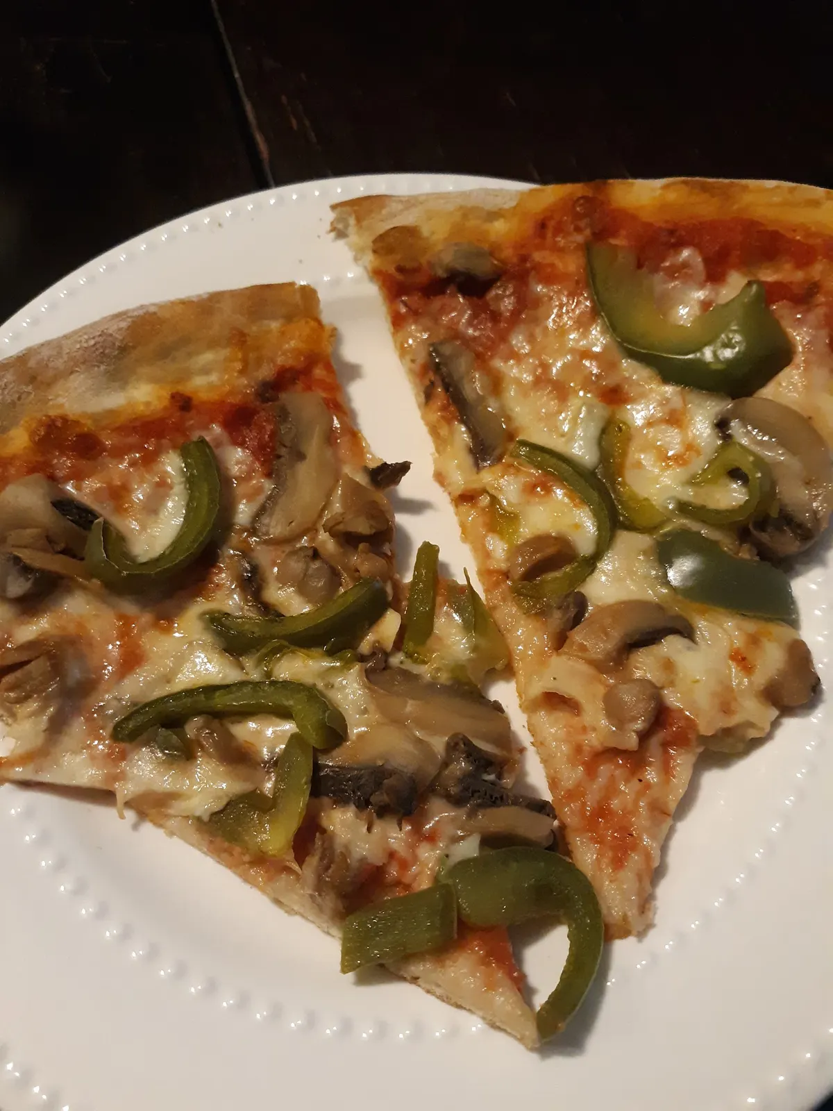Pizza slices with peppers and mushrooms