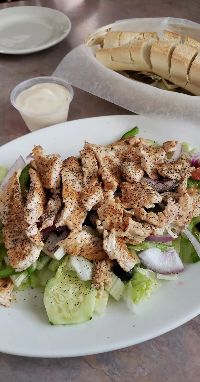 A grilled chicken salad served at Jo-Jo's