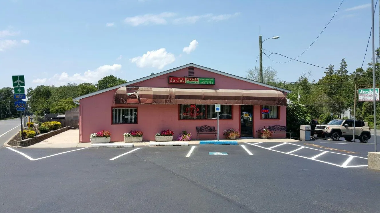 Jo-Jo's red neighborhood pizzeria on West Jimmie Leeds Road